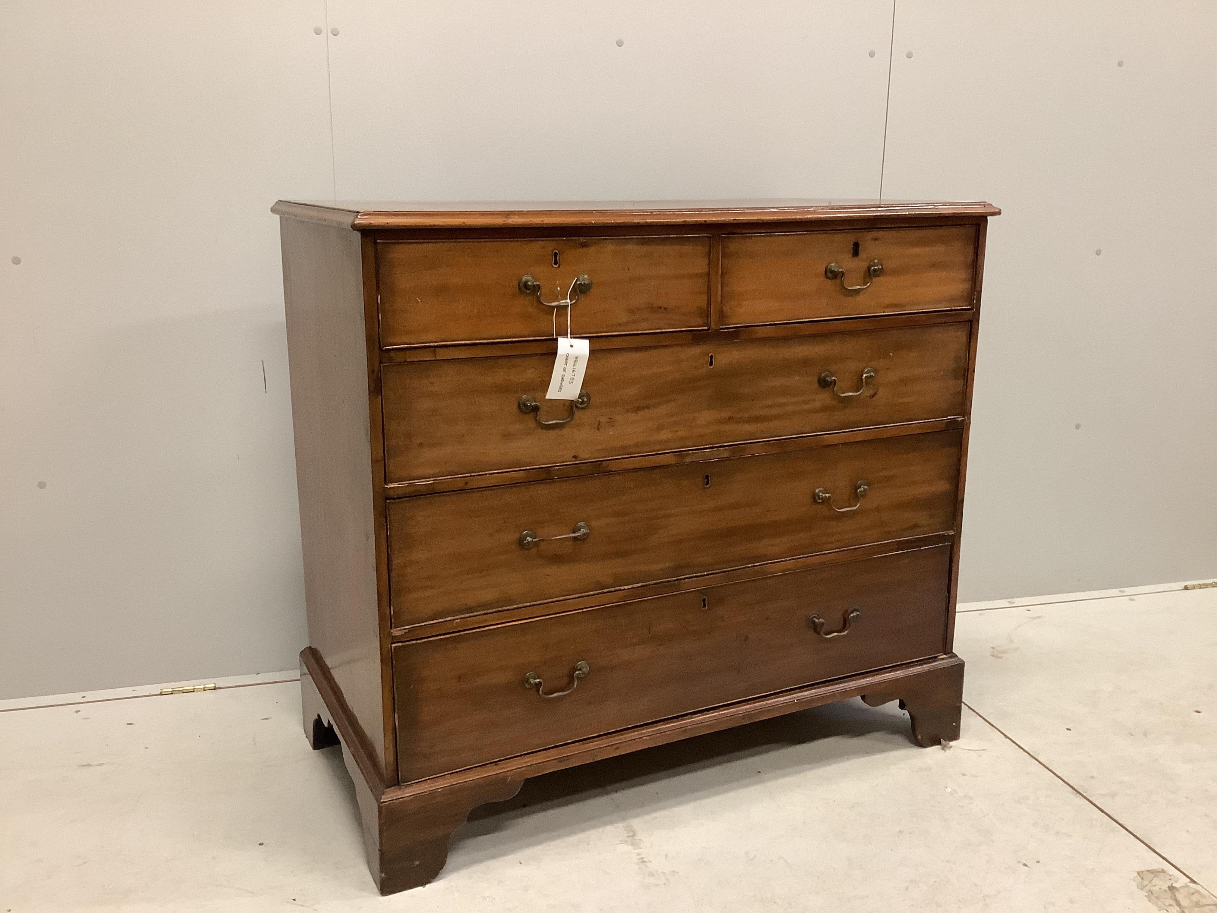 A George III mahogany chest of two short and three long drawers on bracket feet, width 114cm, depth 56cm, height 101cm. Condition - fair